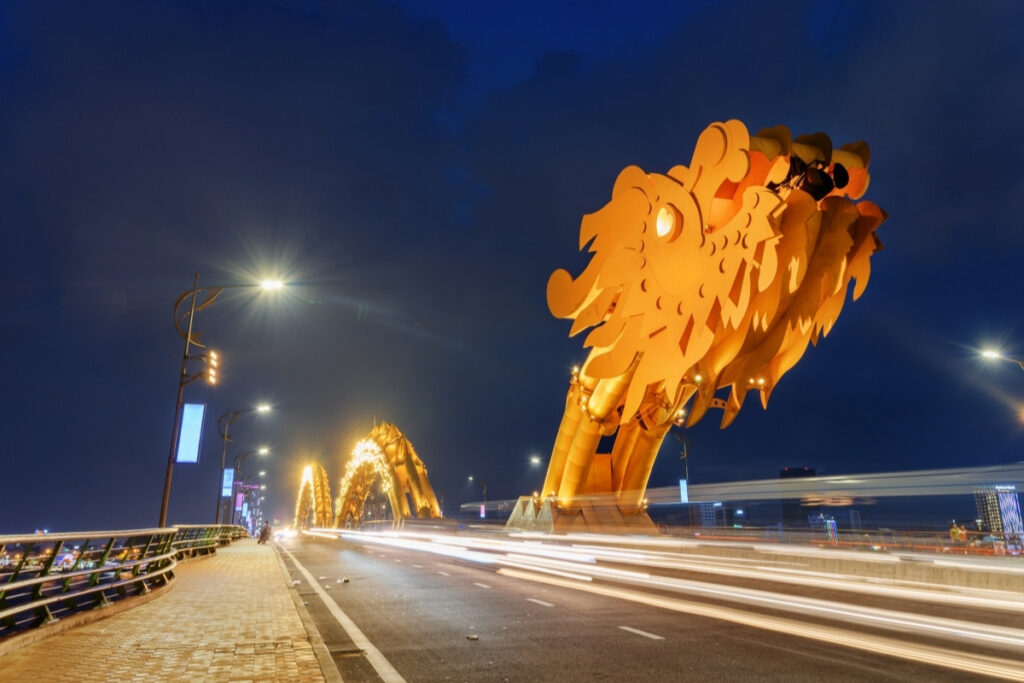 Dragon Bridge illuminated at night in Da Nang