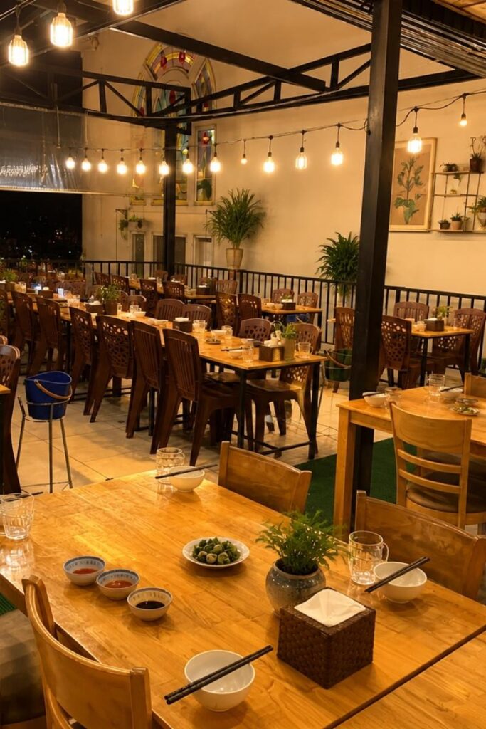 outdoor dining area with string lights at Be Ni 2 Restaurant
